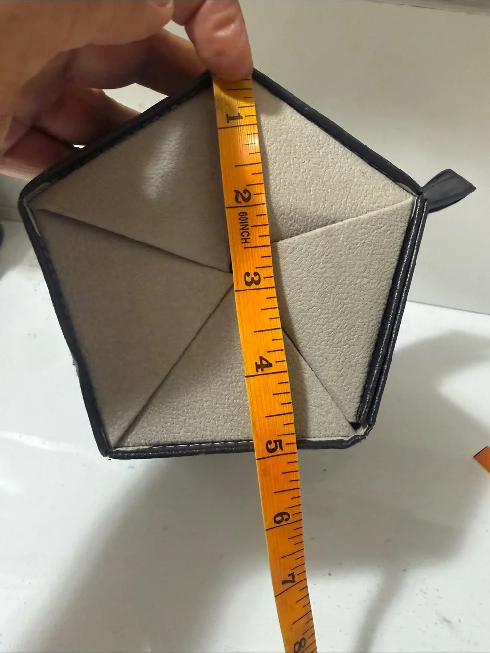 Neutral Hanging Sunglasses Organizer - Compact Foldable Storage.